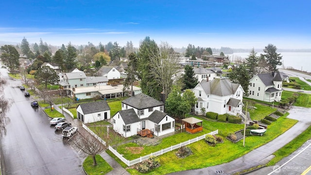 aerial view with a residential view and a water view