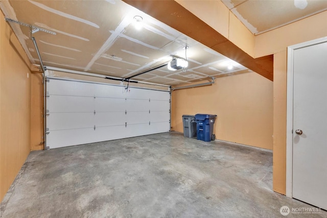 garage featuring a garage door opener