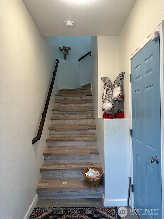 stairway with baseboards