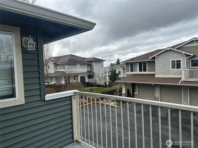 balcony featuring a residential view