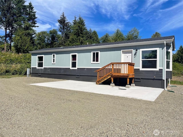 manufactured / mobile home with crawl space and a patio area