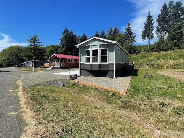 view of front of property with a front lawn