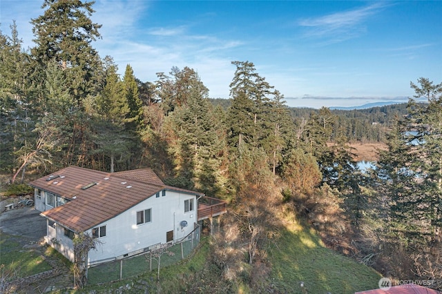 aerial view featuring a view of trees