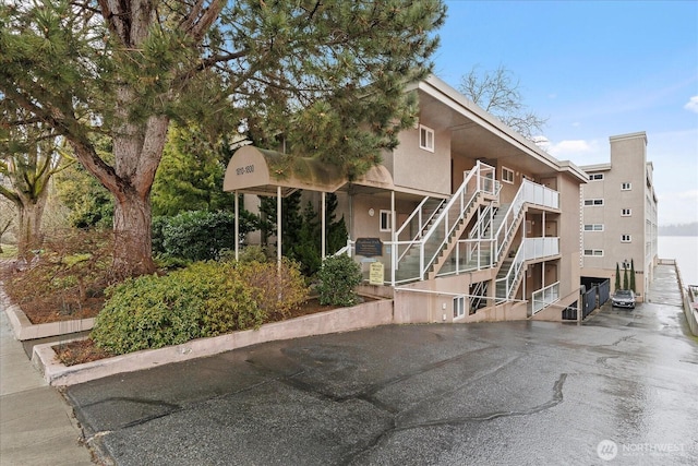 view of property with stairway