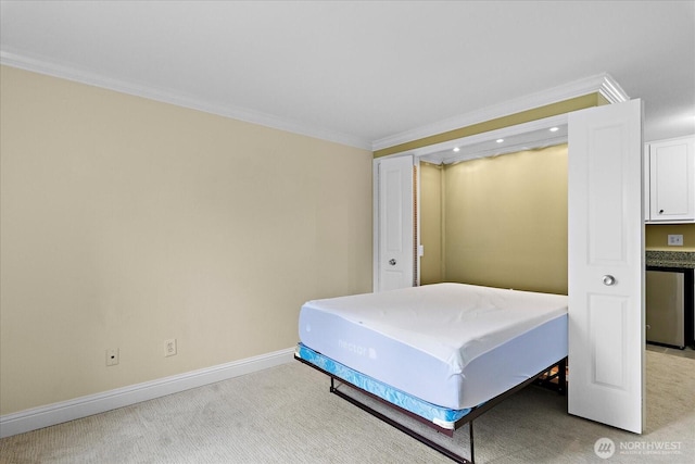 bedroom featuring ornamental molding, light carpet, and baseboards