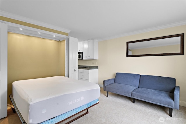 bedroom featuring light carpet, baseboards, and crown molding