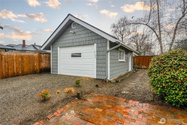 garage featuring fence