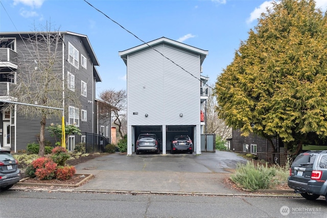 view of property exterior with a garage