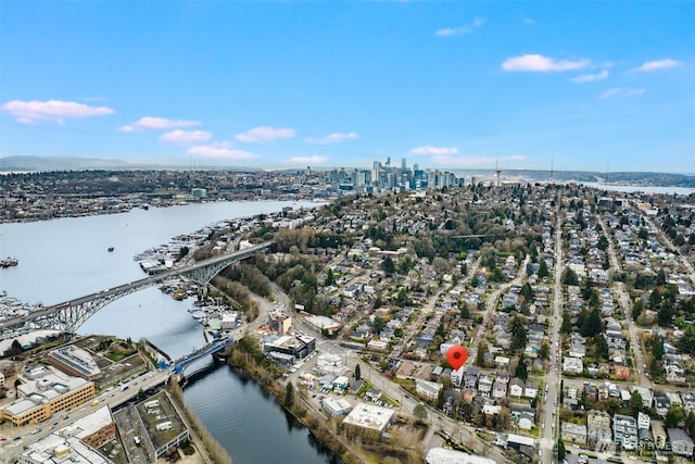 bird's eye view featuring a view of city and a water view