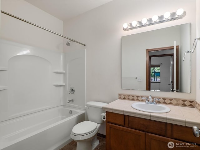 full bathroom with toilet, shower / bath combination, tile patterned flooring, and vanity