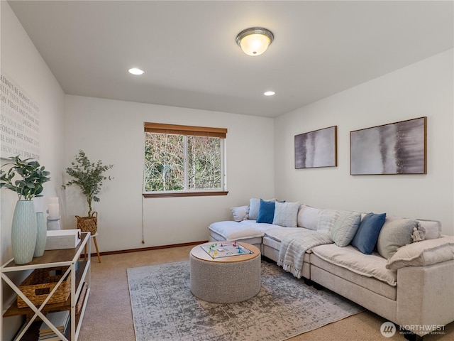 carpeted living room featuring recessed lighting and baseboards