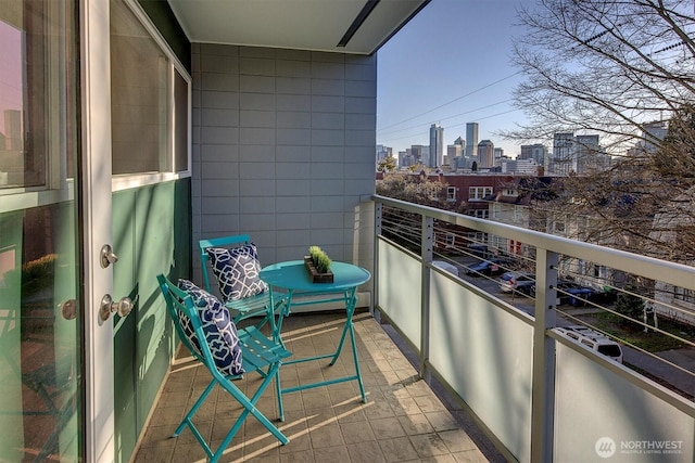 balcony featuring a city view