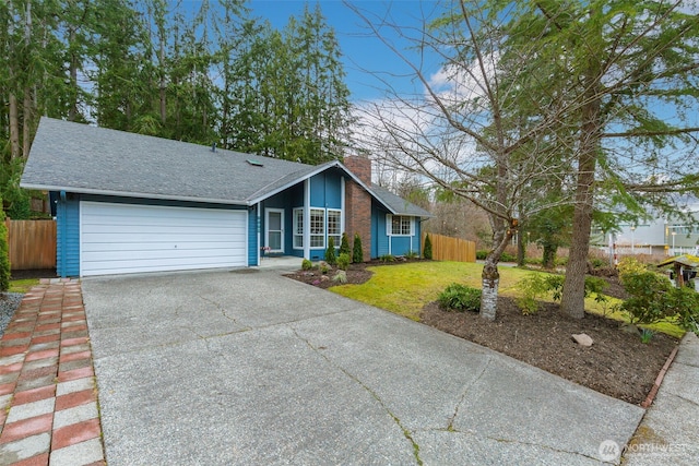 mid-century home with aphalt driveway, roof with shingles, a front yard, fence, and a garage