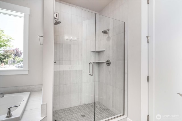 15814 Boise Ln SE, Yelm, WA 98597 - bathroom featuring a garden tub and a stall shower