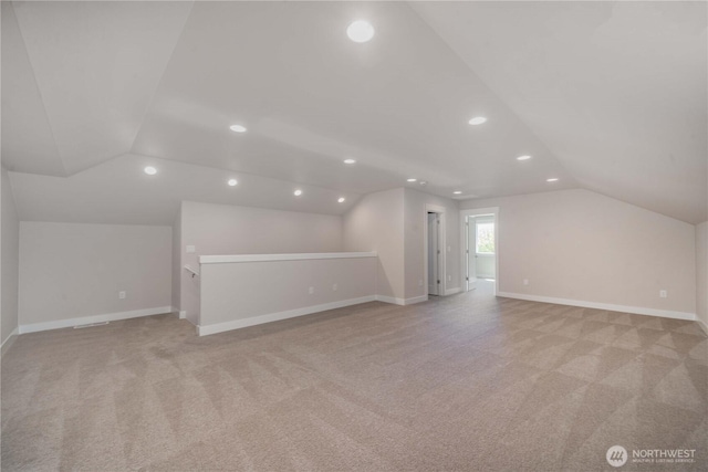 15814 Boise Ln SE, Yelm, WA 98597 - bonus room with light carpet, recessed lighting, lofted ceiling, and baseboards