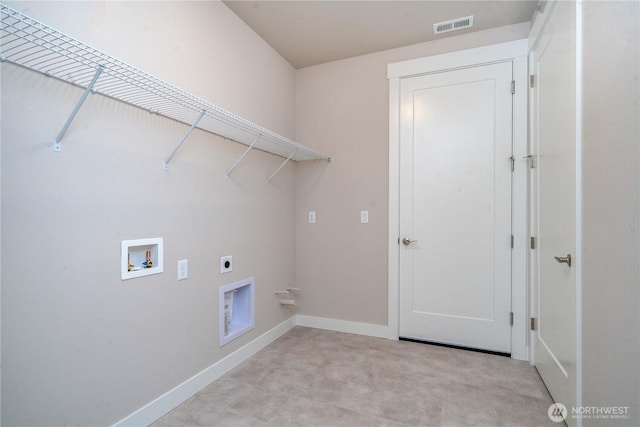 15814 Boise Ln SE, Yelm, WA 98597 - laundry area featuring hookup for an electric dryer, laundry area, washer hookup, visible vents, and baseboards
