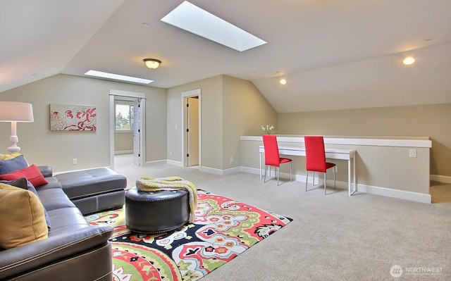 15814 Boise Ln SE, Yelm, WA 98597 - living area with vaulted ceiling with skylight, light colored carpet, and baseboards