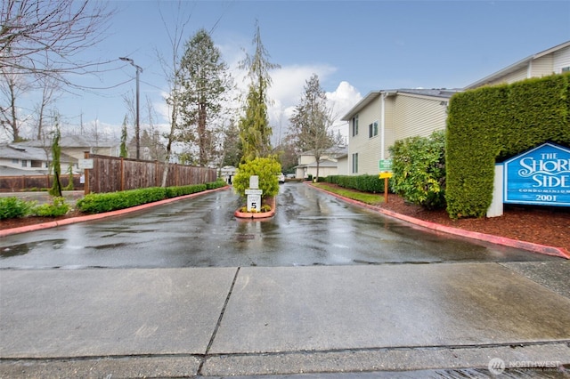 view of road featuring curbs