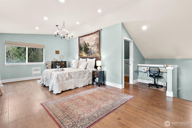 bedroom featuring lofted ceiling, wood finished floors, and recessed lighting