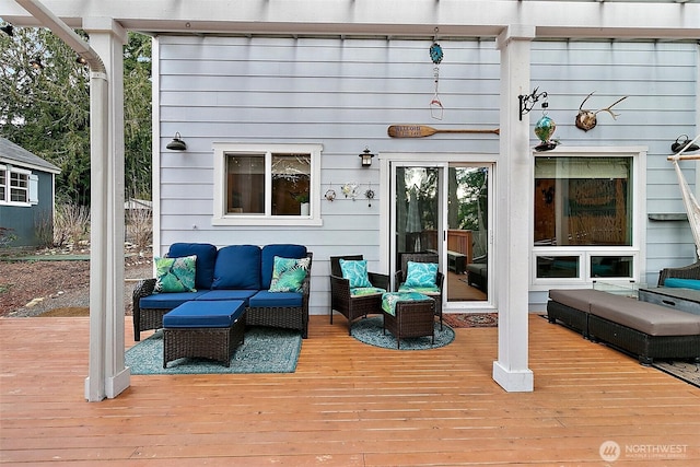 wooden terrace featuring outdoor lounge area