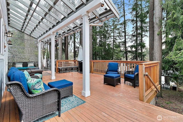 wooden terrace featuring outdoor lounge area