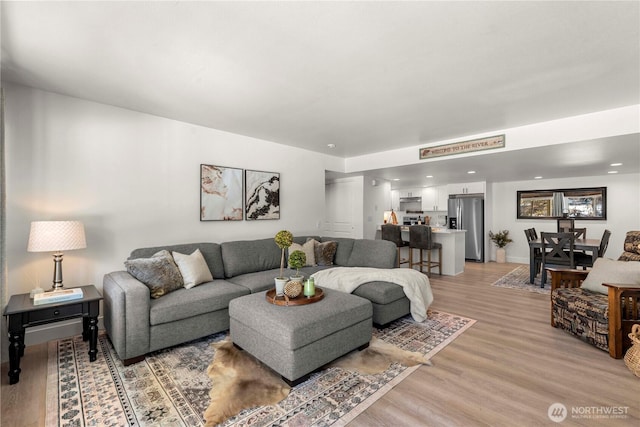 living area with light wood-style flooring