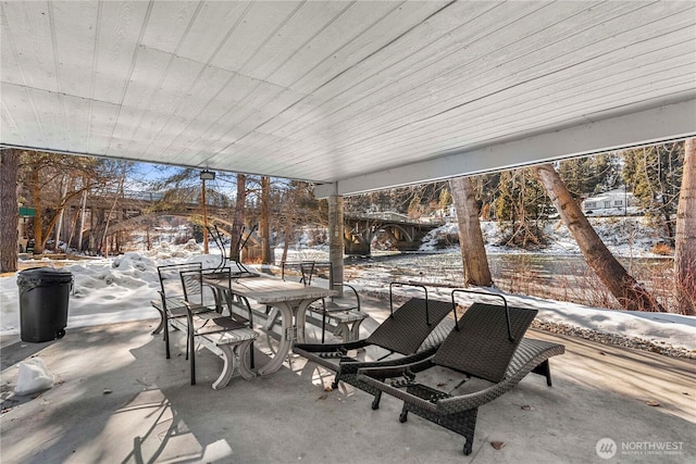 view of snow covered patio