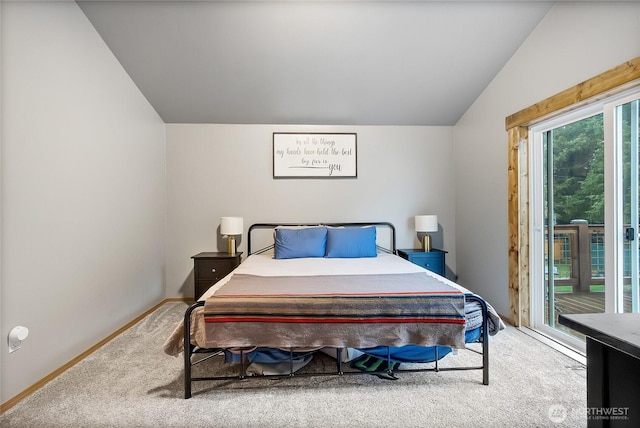 bedroom featuring carpet floors, access to exterior, vaulted ceiling, and baseboards