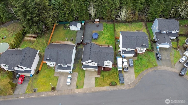 birds eye view of property with a residential view