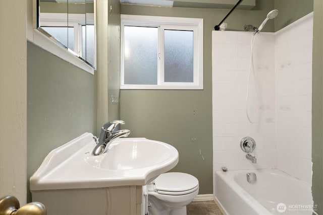 full bathroom featuring  shower combination and toilet