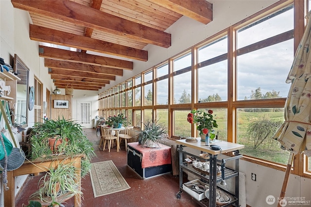 sunroom featuring wood ceiling and beamed ceiling