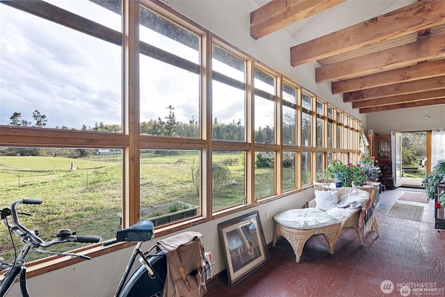 sunroom with beam ceiling