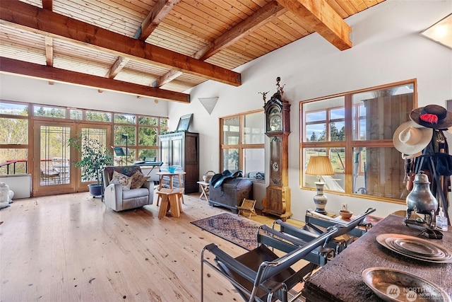 interior space featuring wood ceiling, beam ceiling, and french doors