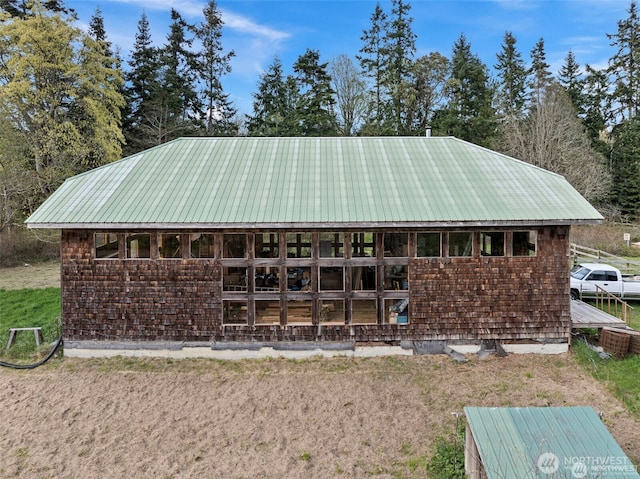 view of front of house featuring metal roof