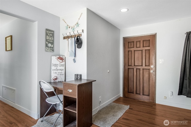 entryway featuring dark wood-style floors, recessed lighting, and baseboards