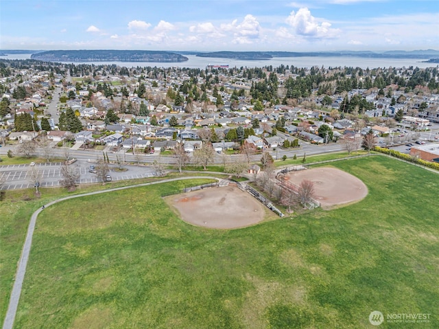 aerial view featuring a residential view and a water view