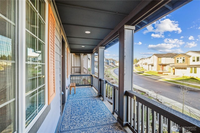 balcony featuring a residential view