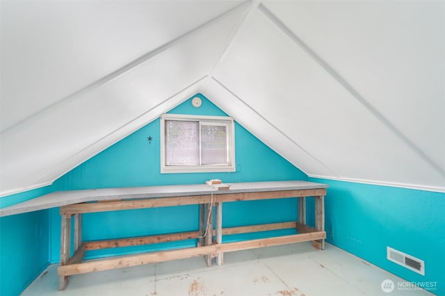 additional living space with vaulted ceiling and visible vents