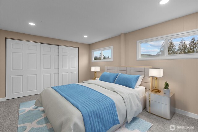 bedroom with light carpet, a closet, recessed lighting, and baseboards