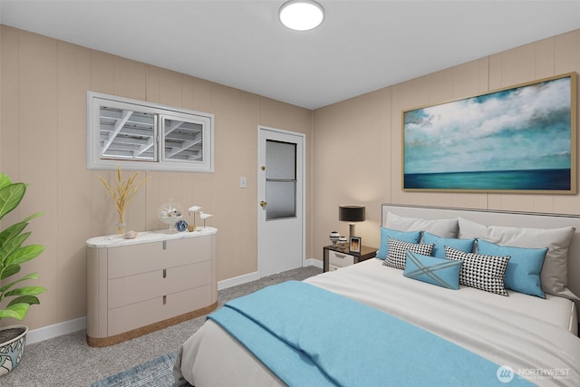 carpeted bedroom with baseboards