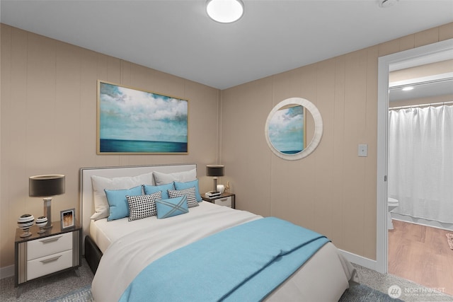 bedroom featuring wood finished floors