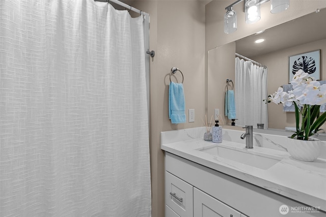 full bath featuring vanity
