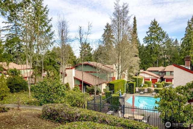 community pool with fence