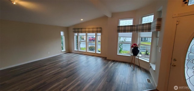 empty room featuring visible vents, baseboards, dark wood-style flooring, vaulted ceiling with beams, and recessed lighting