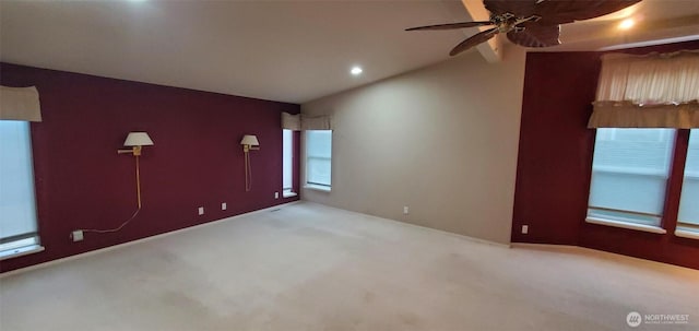 carpeted empty room featuring ceiling fan, baseboards, and recessed lighting