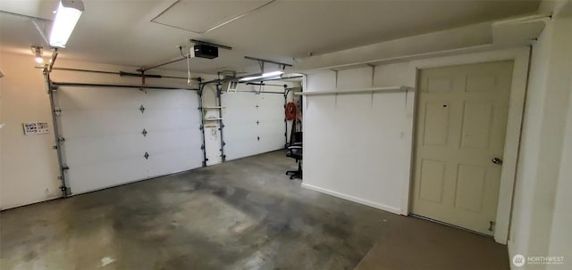 garage featuring a garage door opener