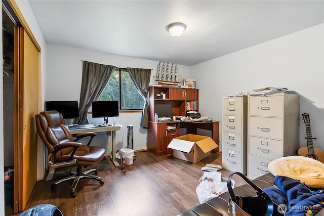 office featuring dark wood-type flooring