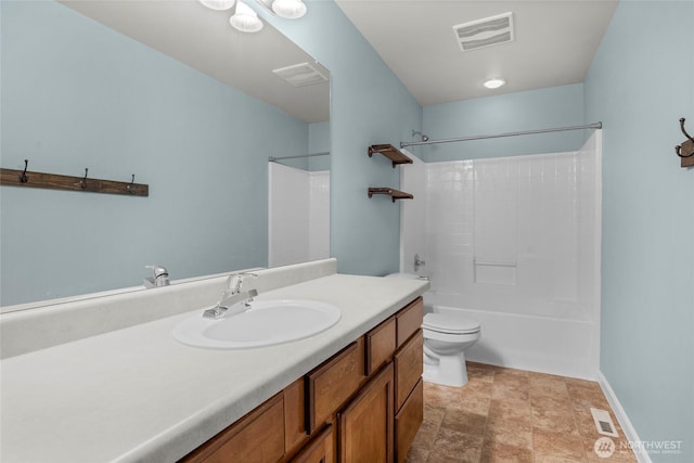 full bathroom featuring toilet, washtub / shower combination, vanity, and visible vents