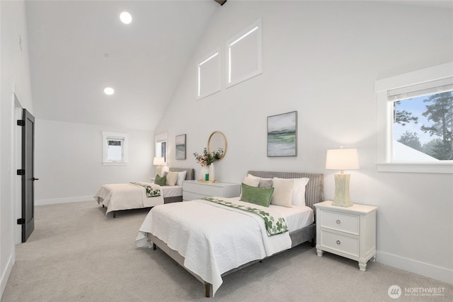 bedroom with baseboards, high vaulted ceiling, and light colored carpet