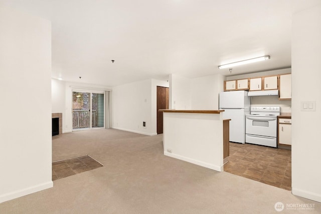 kitchen featuring white appliances, light carpet, under cabinet range hood, and open floor plan